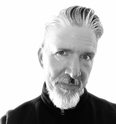 A photograph of the author, David Paul George